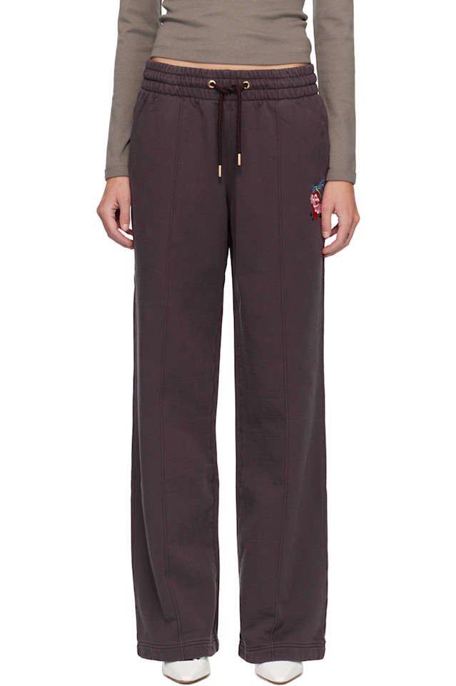 

Casablanca Фиолетовые спортивные штаны с цветочным принтом и асимметричным низом в виде стрекозы