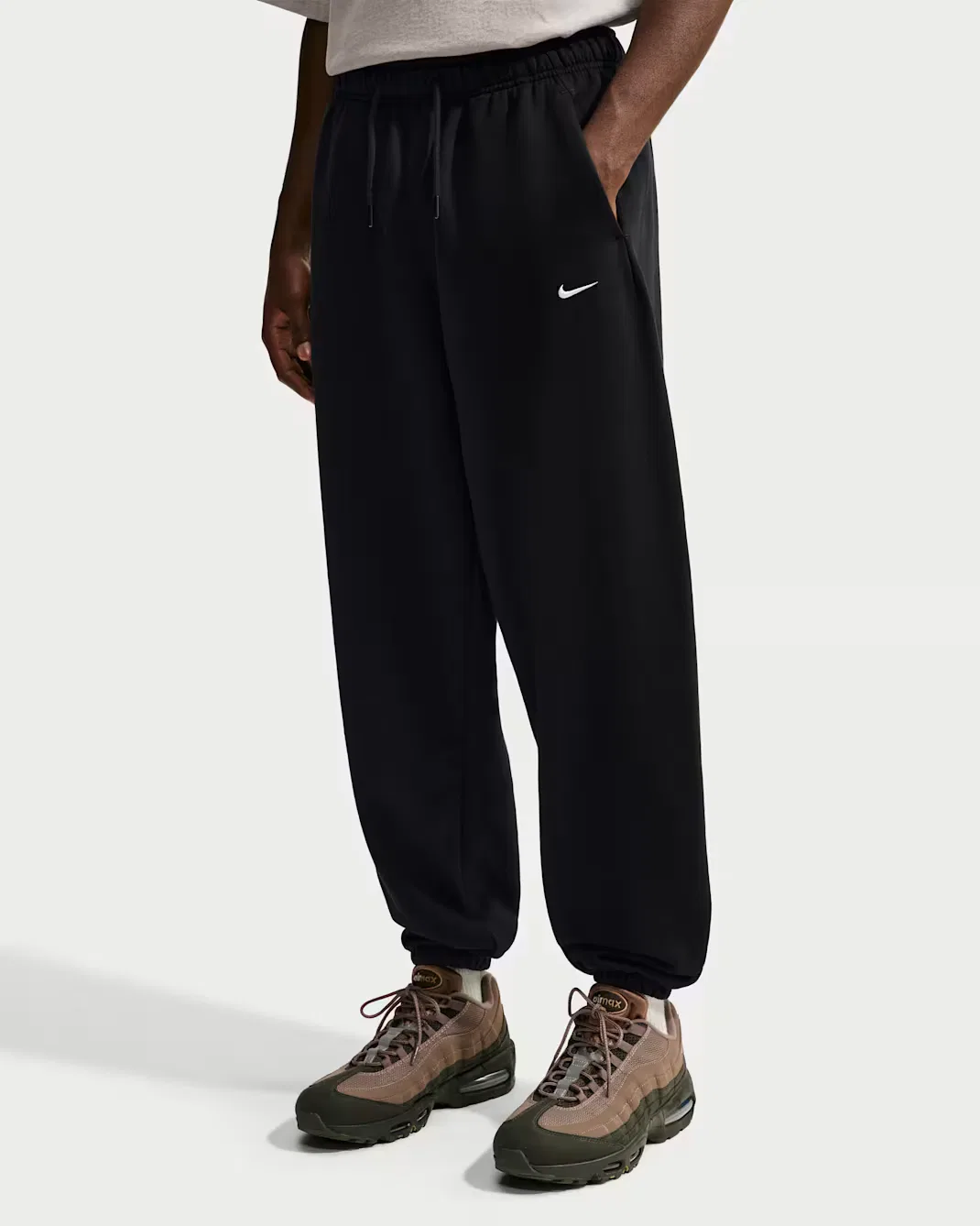Мужские брюки с манжетами Nike Solo Fleece, Total Black/Sail — фото 2