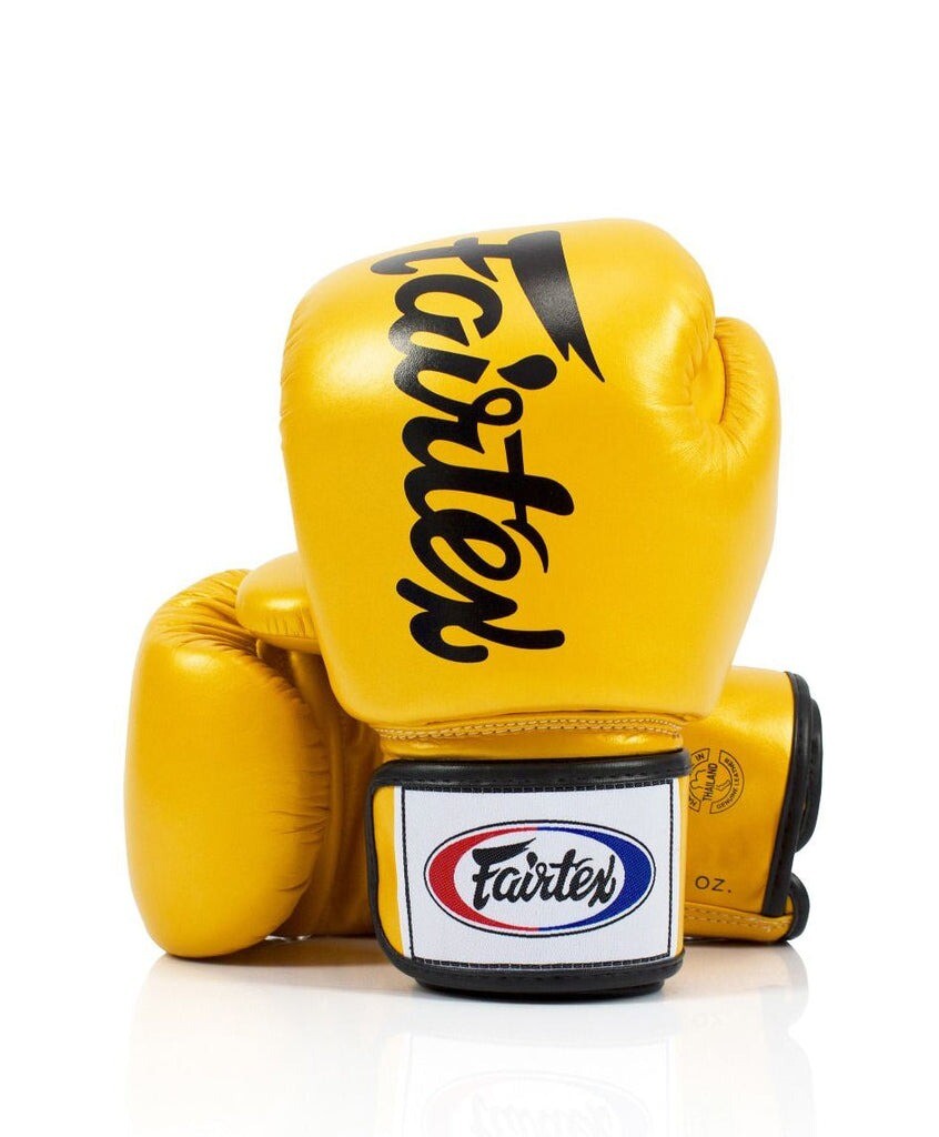 

Боксерские перчатки Fairtex Deluxe Tight-Fit, 14 oz., золотисто-желтый
