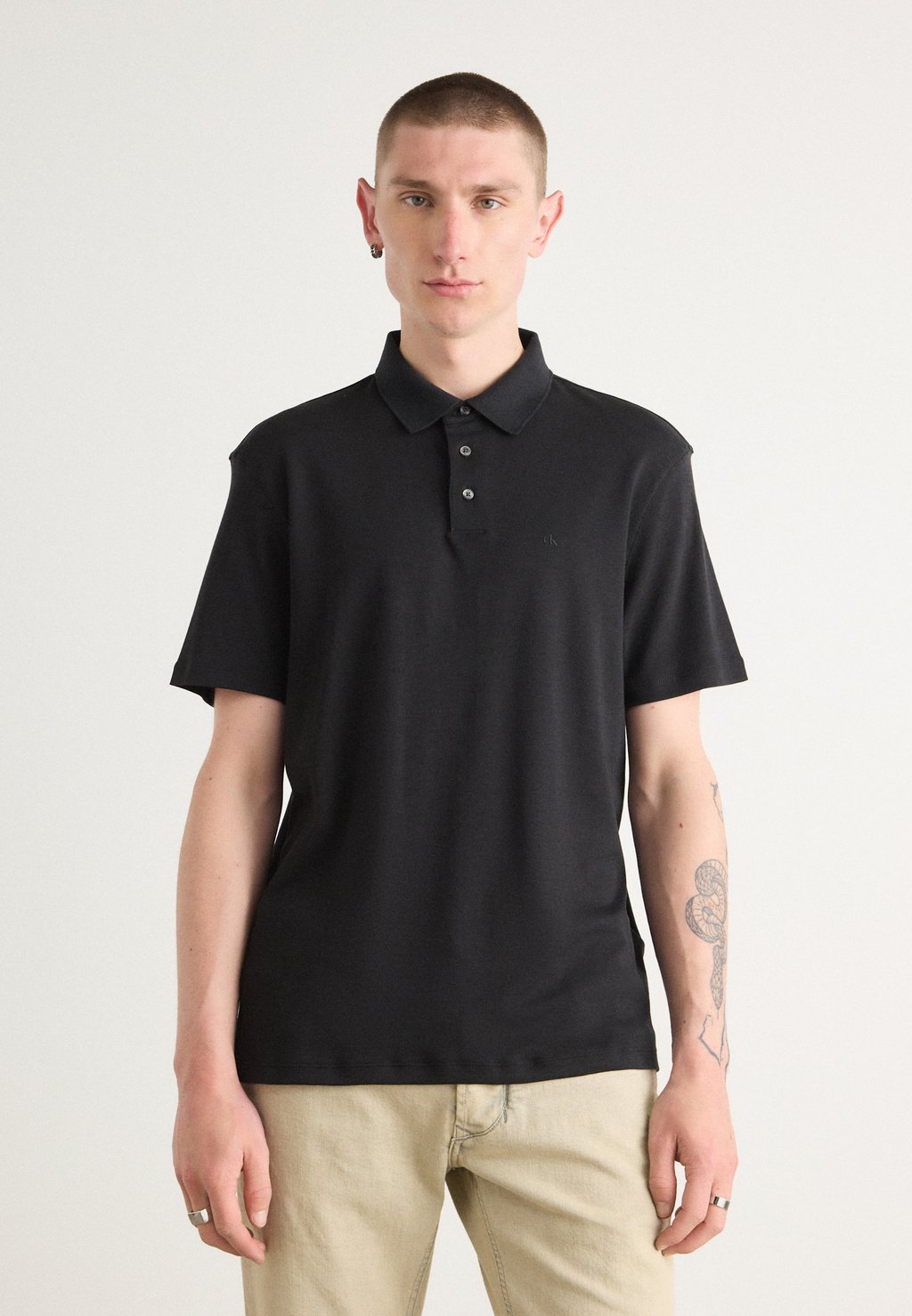 

Поло CHEST Calvin Klein, черный