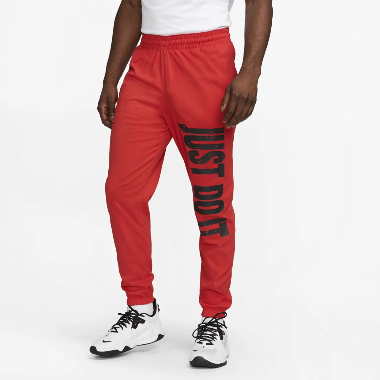 Мужские спортивные штаны из гладкой тянущейся ткани Nike DNA Woven, красный/черный