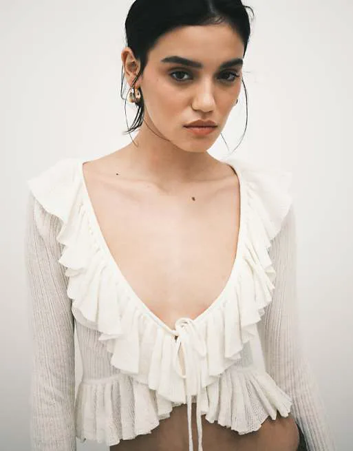 

Белоснежный кардиган с оборками Monki