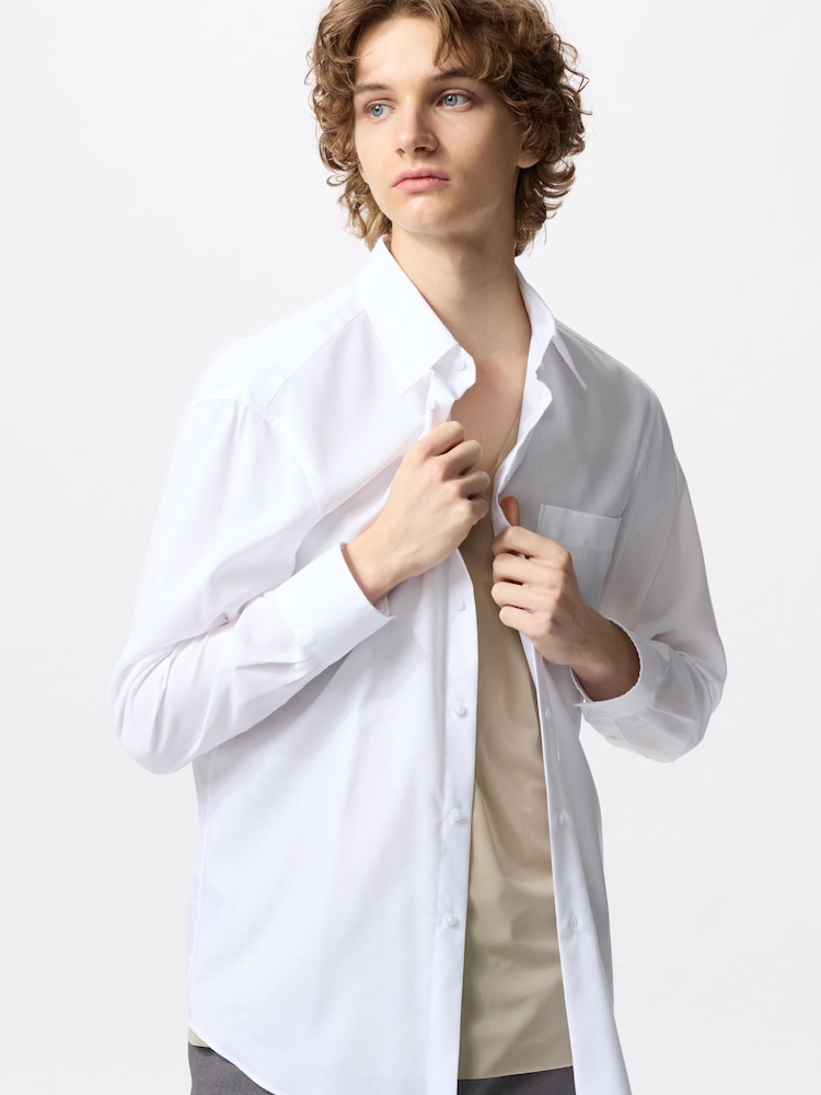 Футболка Uniqlo Airism Mesh с V-образным вырезом, черная — фото 2