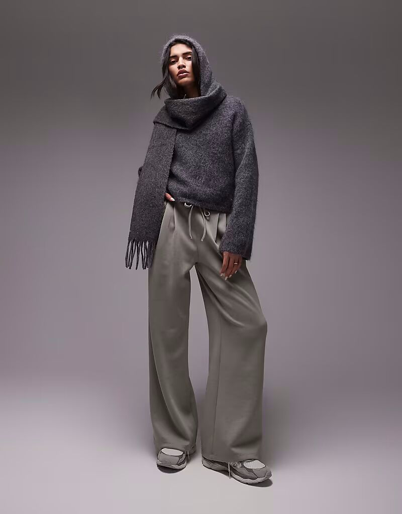 

Расклешенные джоггеры цвета манго бледно-зеленого цвета