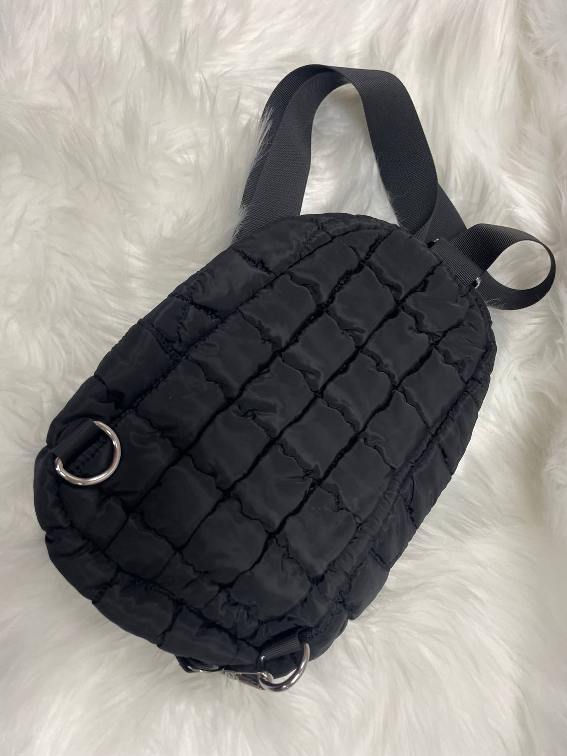 

Women's Puffer Sling Bags In Black Wall to Wall