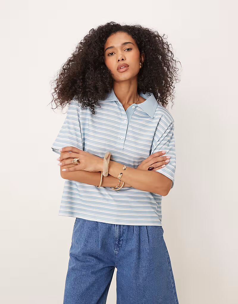 

Рубашка-поло свободного кроя ASOS DESIGN с подплечниками в синюю полоску