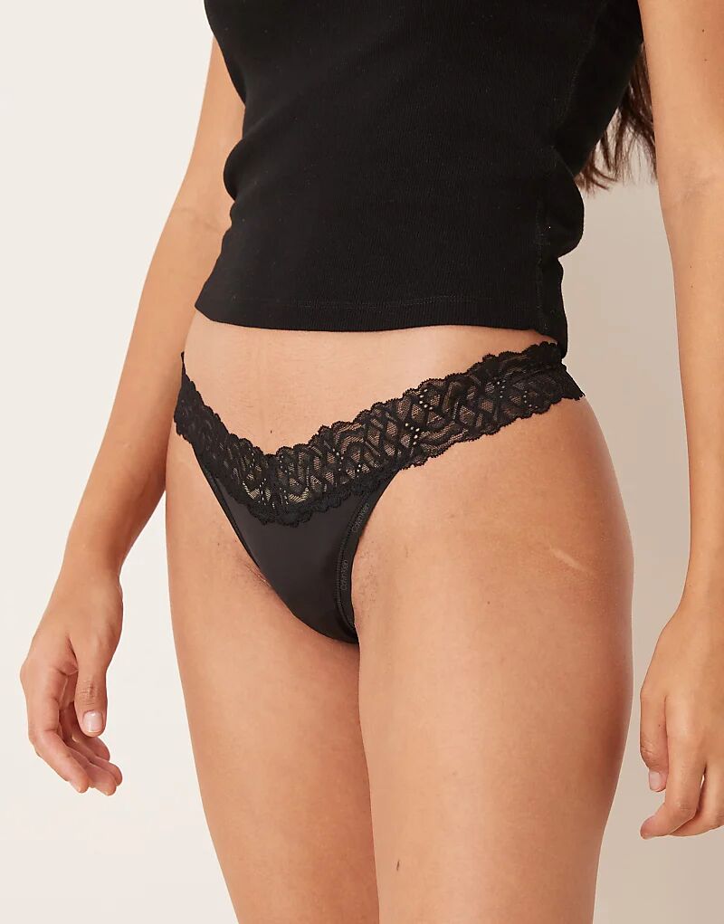 

Трусики-стринги Calvin Klein Attraction с кружевной отделкой, черного цвета