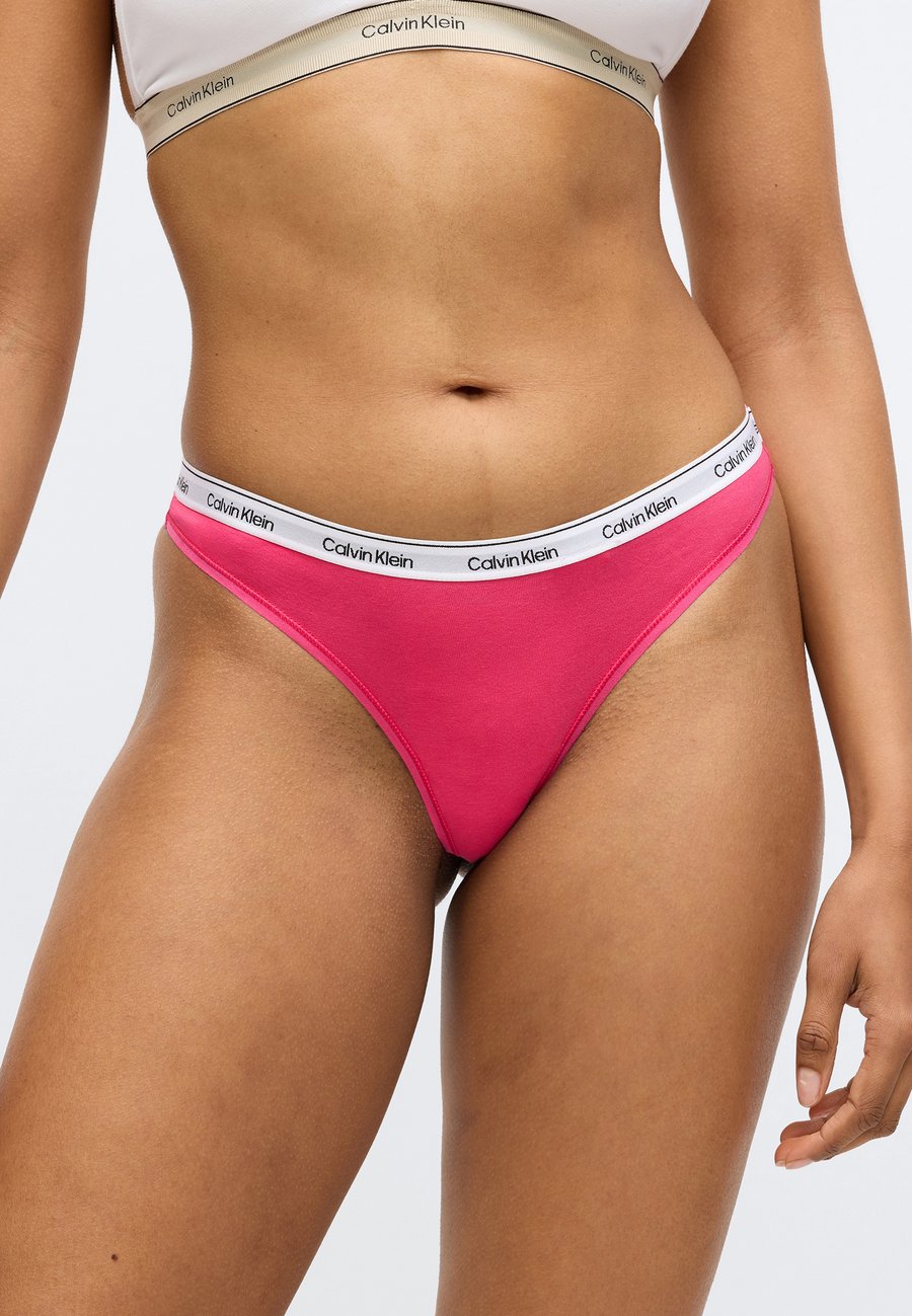 

Трусы Calvin Klein Underwear THONG LOGO ICON 3 PACK , Innuendo/Dark Berry/Pink