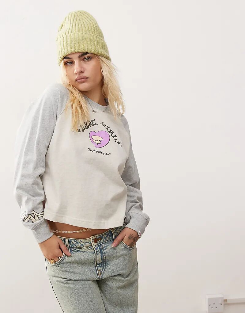 

Футболка цвета слоновой кости с контрастной вставкой на рукаве и логотипом Aape By A Bathing Ape
