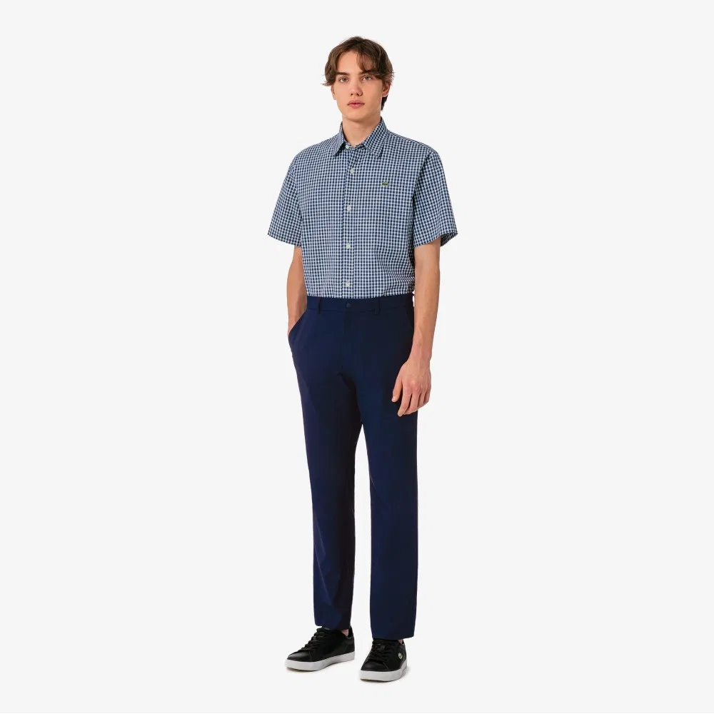 Мужские весенние эластичные брюки тёмно-синие от Lacoste — фото 4