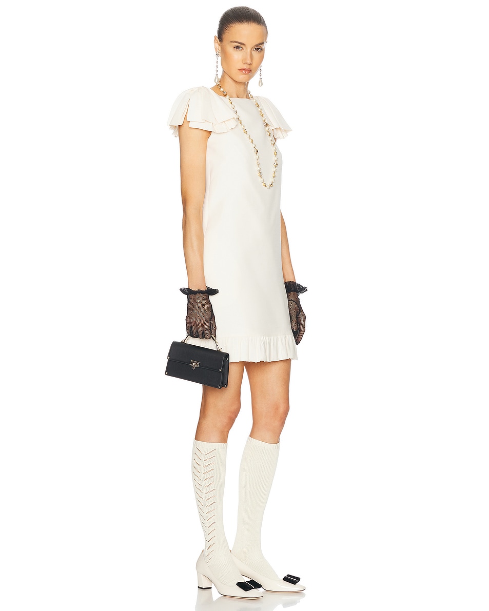 

Мини-сумка Rockstud Valentino Garavani, цвет Nero