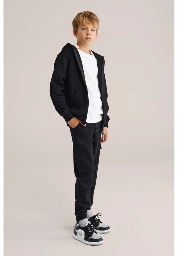 Брюки из хлопка и полиэстера Kareivisko stiliaus kelnes We Fashion, черный