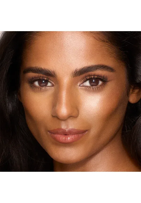 Невероятно сияющая тональная основа для лица Unreal Skin Sheer Glow Tint 9 г Charlotte Tilbury, цвет 9_tan — фото 2