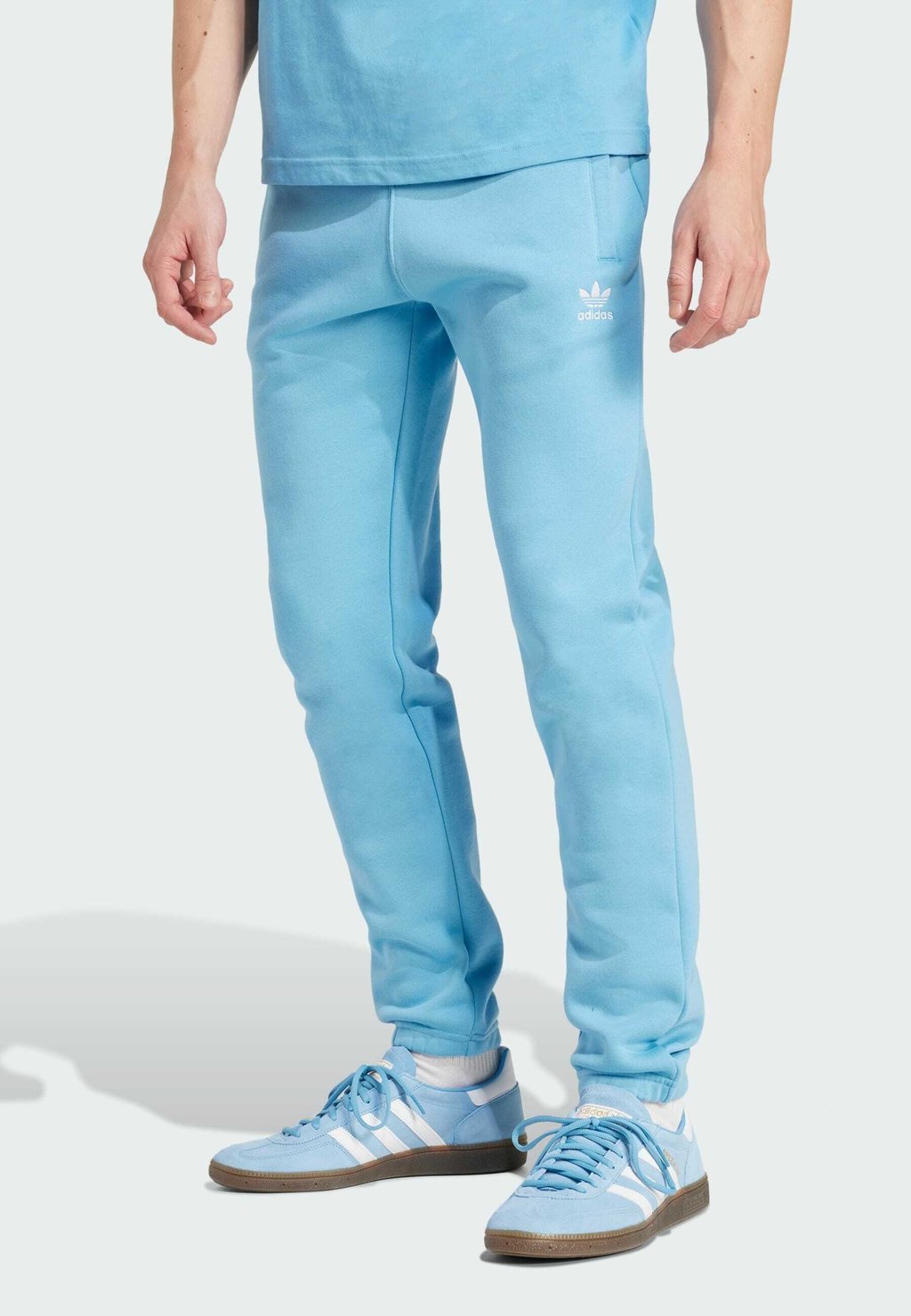

Спортивные брюки TREFOIL ESSENTIALS adidas Originals, светло-голубой