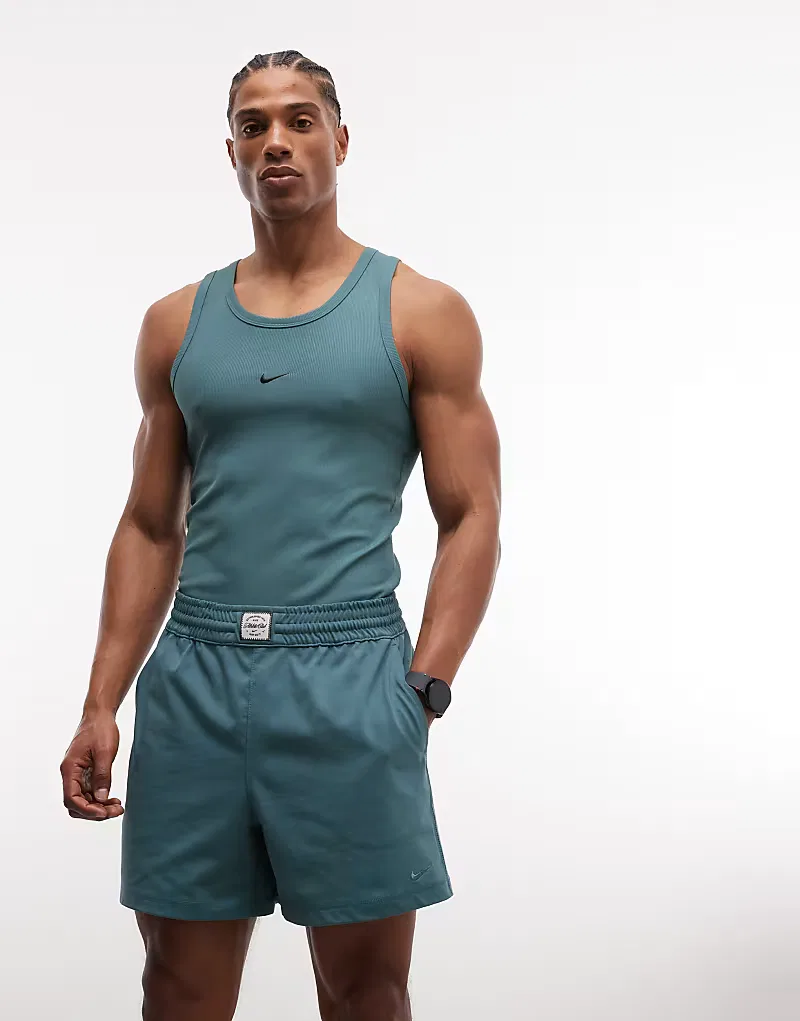 Вязаные шорты Nike с эластичным поясом, зеленого — фото 4