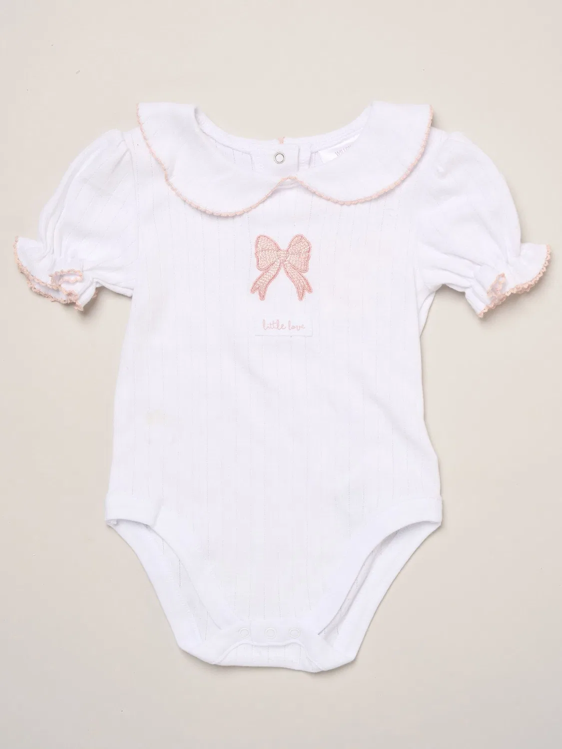 Комплект одежды для новорожденных Rock-A-Bye Baby Boutique, розовый с принтом бантов — фото 2