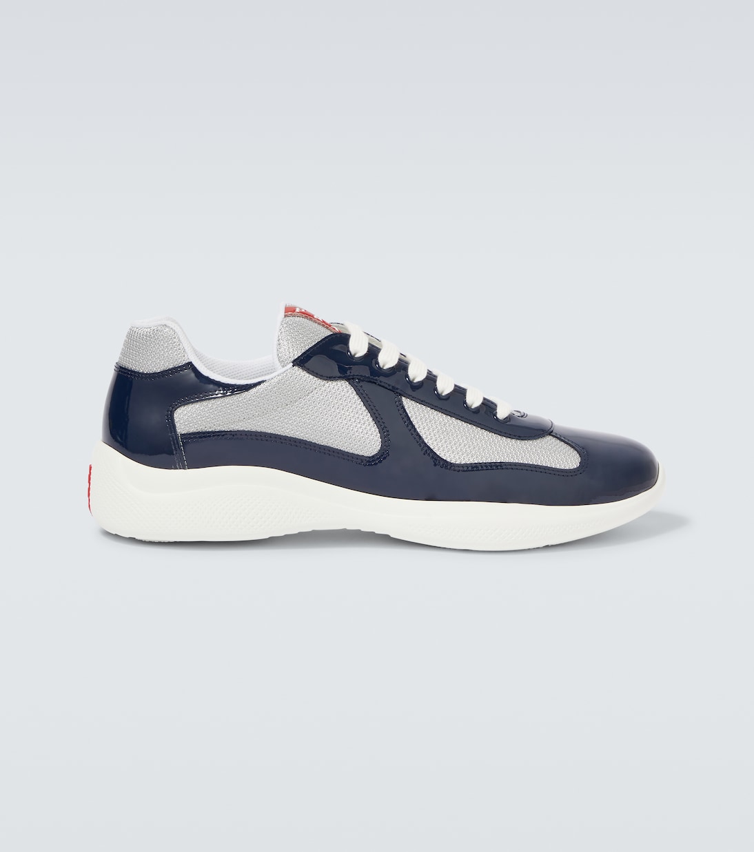 

Кроссовки из лаковой кожи Prada, синий