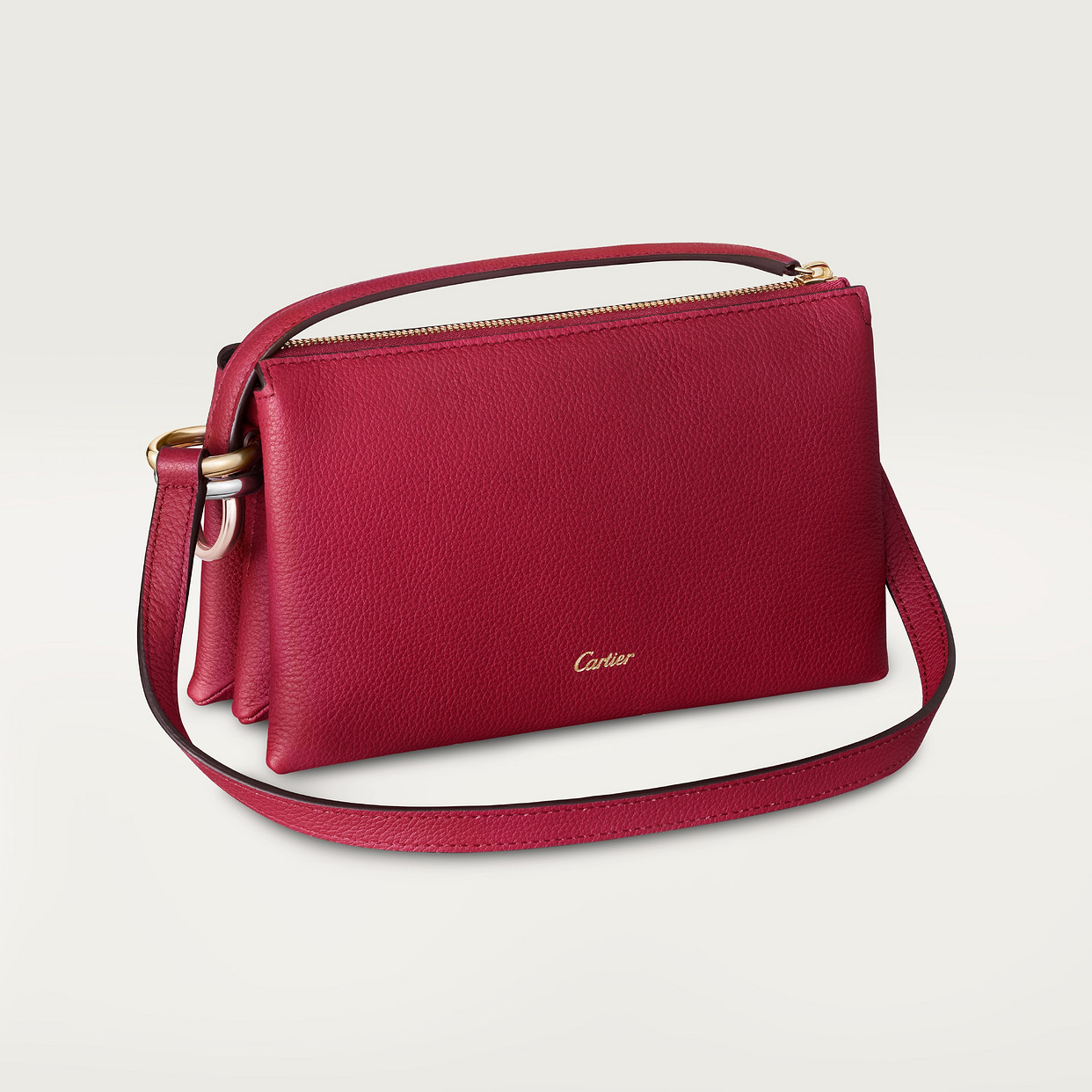 

Женская сумка через плечо Cartier Mini sac porté épaule, Trinity, рубиновая зернистая телячья кожа
