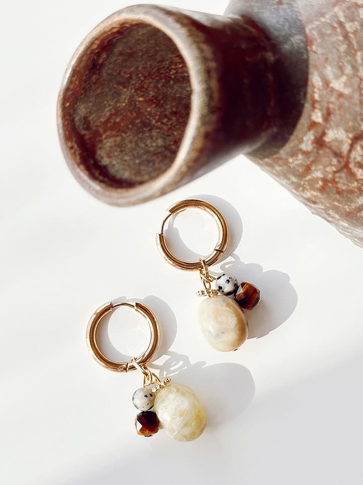 

Серьги-кольца с драгоценными камнями Heliophilia