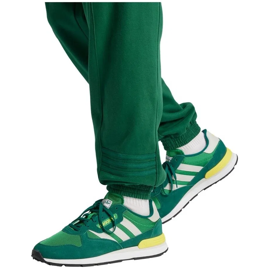 Спортивные брюки из футера с зауженными штанинами и 3 полосками adidas, Зеленый — фото 4