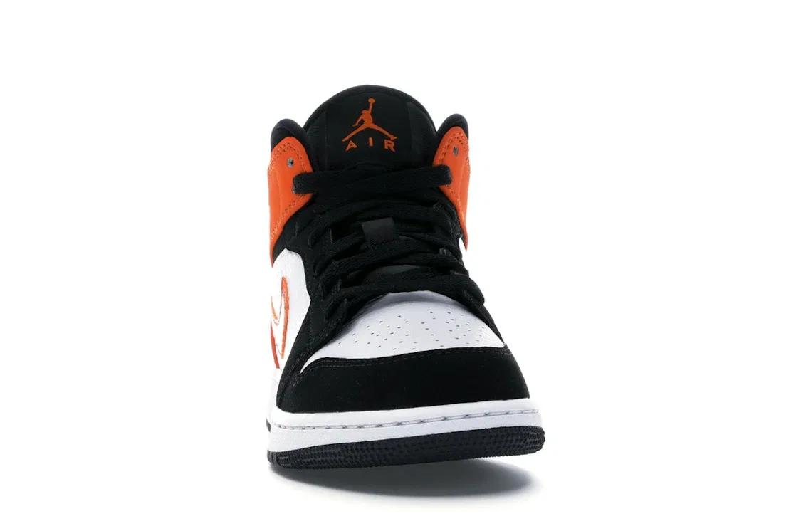 Детские кроссовки для мальчиков с кожаным верхом Jordan 1 Mid, Black/Starfish-Starfish-White — фото 2