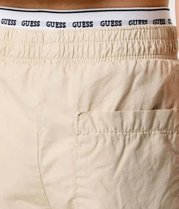 Детские брюки для девочек хлопковые Guess, бежевый — фото 4