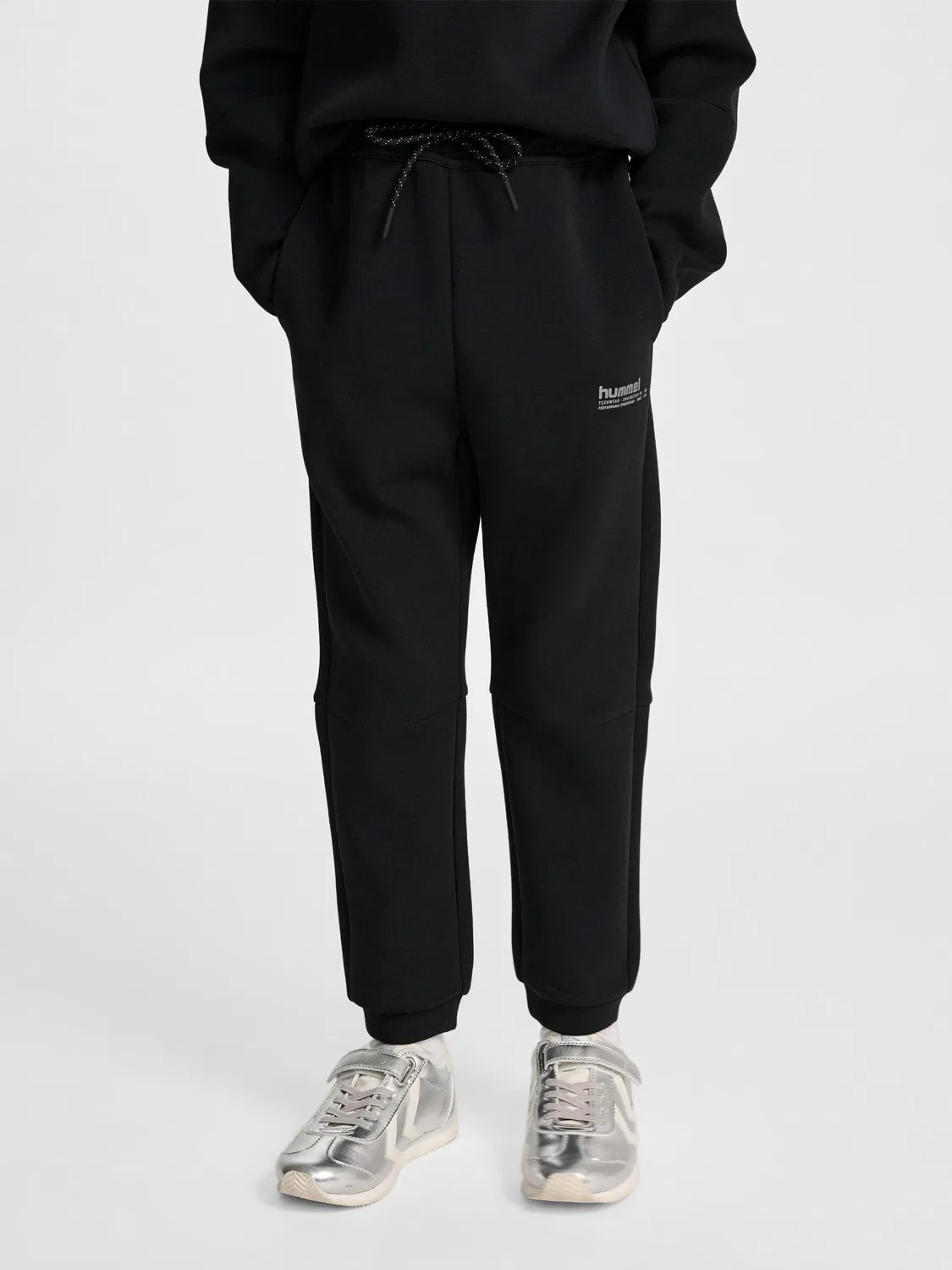 Детские спортивные штаны Tech Fleece Hmljr Hummel, Schwarz