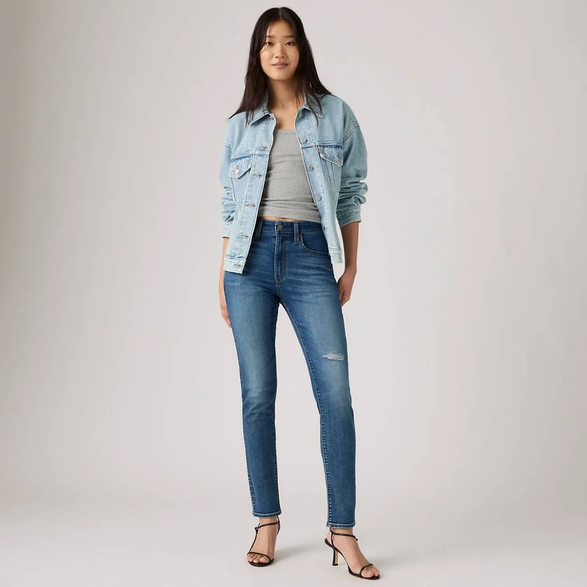 джинсы с высокой посадкой 721 и зауженными штанинами для женщин Levi's, Ripped Page - Medium Wash