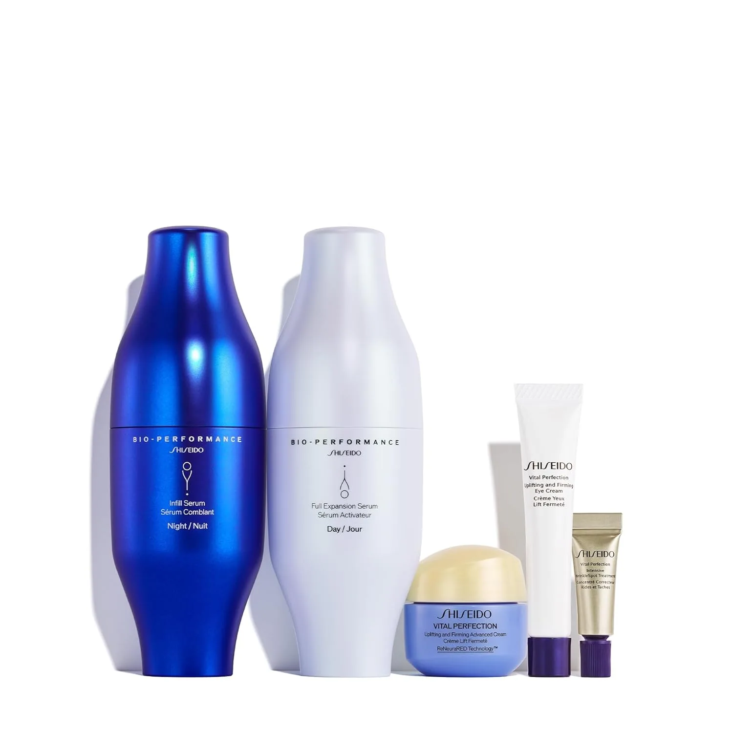 Набор Shiseido Day-to-Night для упругости кожи - сыворотки Bio-Performance Skin Filler (30 мл x2), крем Vital Perfection Advanced (15 мл), крем для глаз (5 мл) и Intensive WrinkleSpot Treatment (2 мл) — фото 2