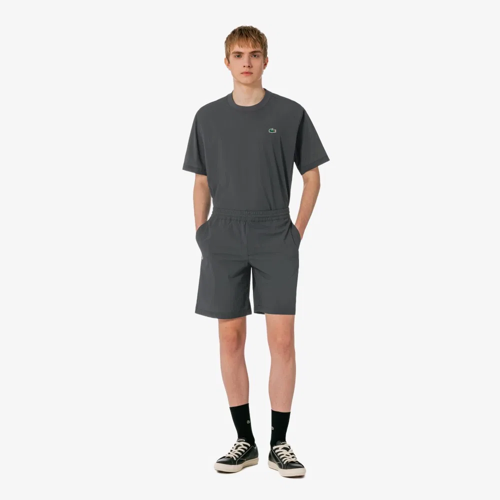 Мужские теннисные шорты из тканого материала тёмно-серые от Lacoste — фото 4