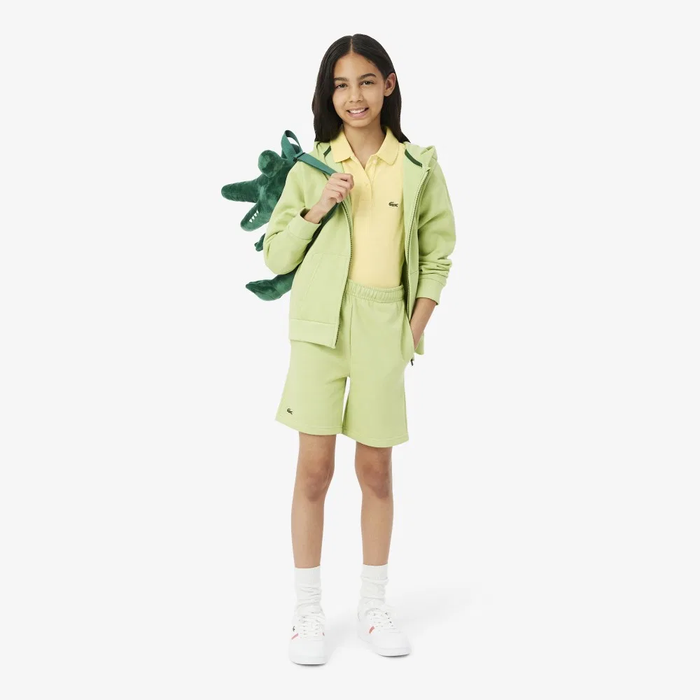 Детская рубашка-поло с пышными рукавами светло-жёлтая от Lacoste — фото 4