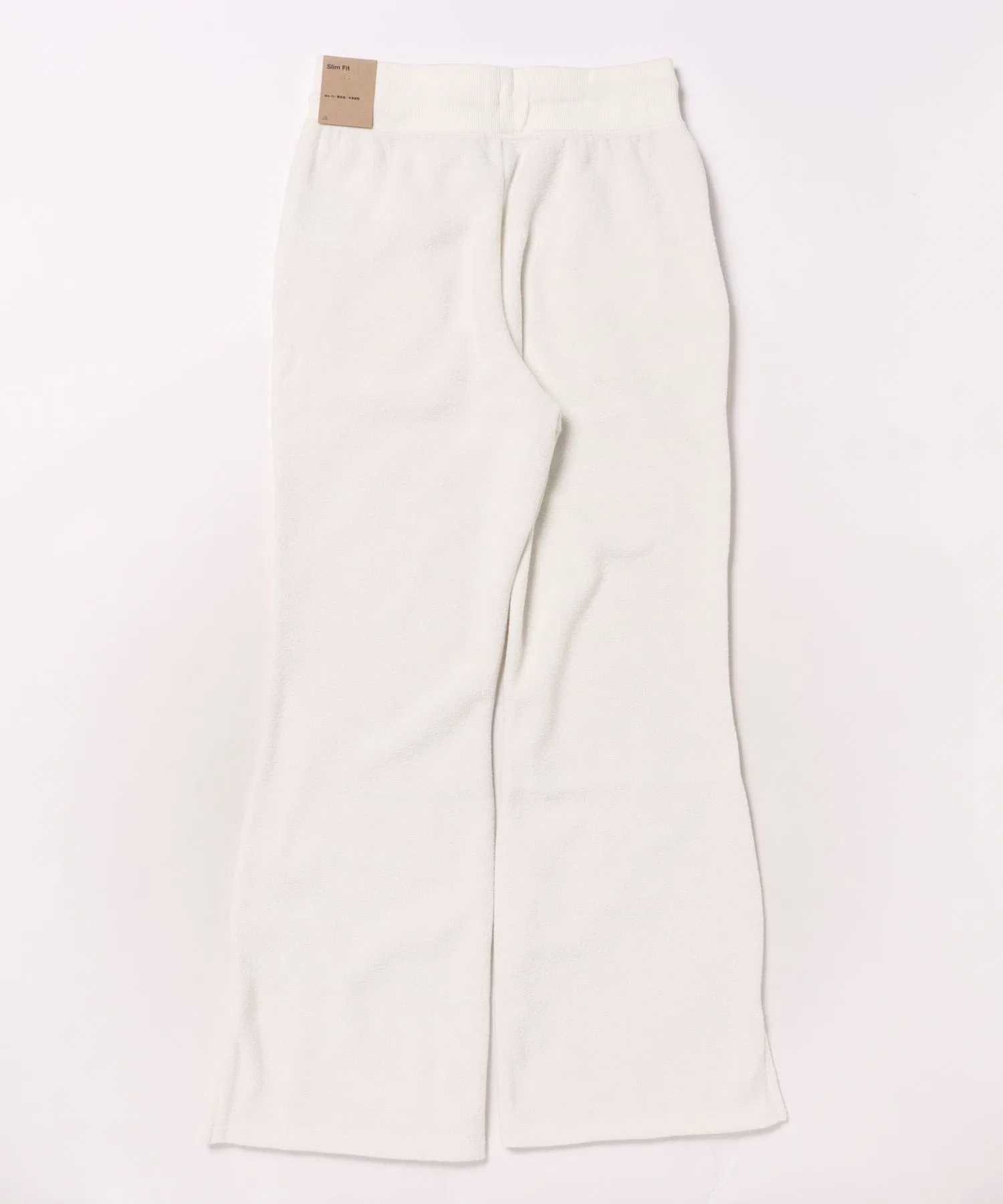 Длинные брюки NIKE K FLC PNT COZY HV0407 047SFTPRL/WHT — фото 2