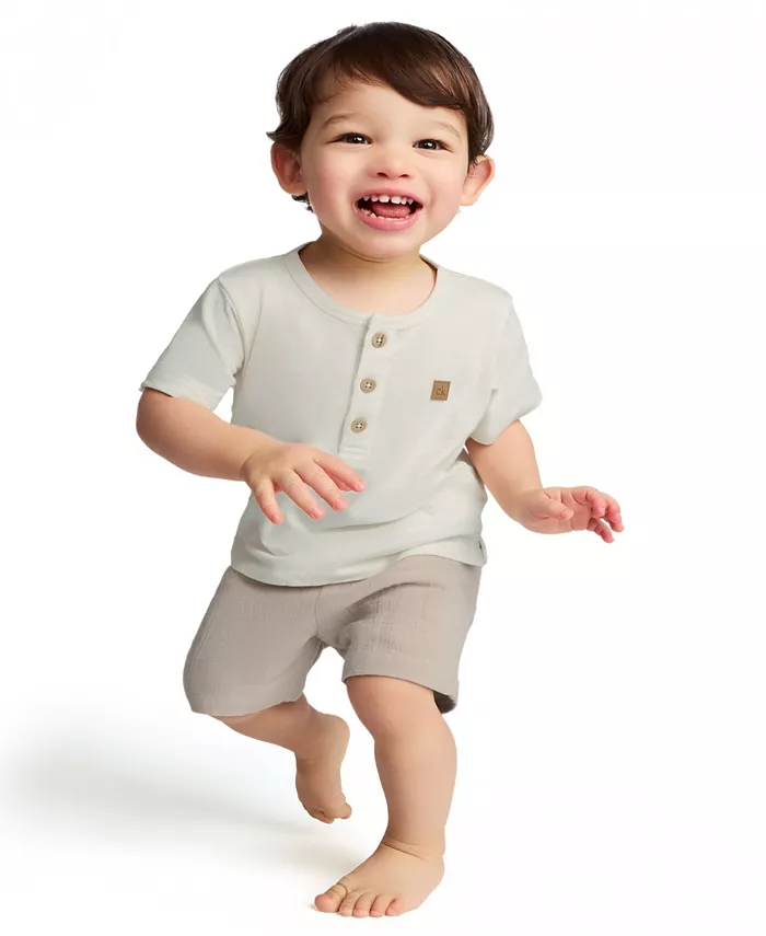 

Детский комплект для мальчиков: футболка-поло из джерси с эффектом утолщенной нити и шорты в клетку в тон Calvin Klein