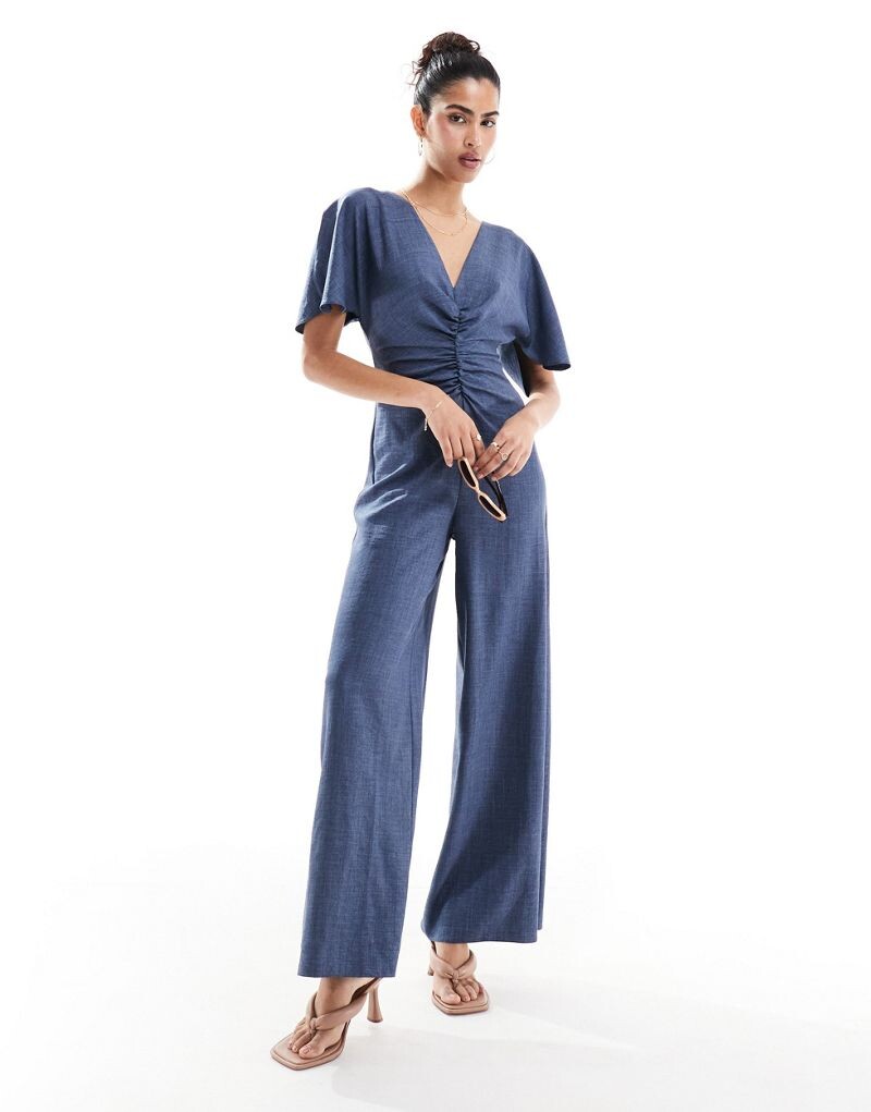 

ASOS DESIGN - Темно-синий комбинезон с рюшами спереди и вырезом сзади