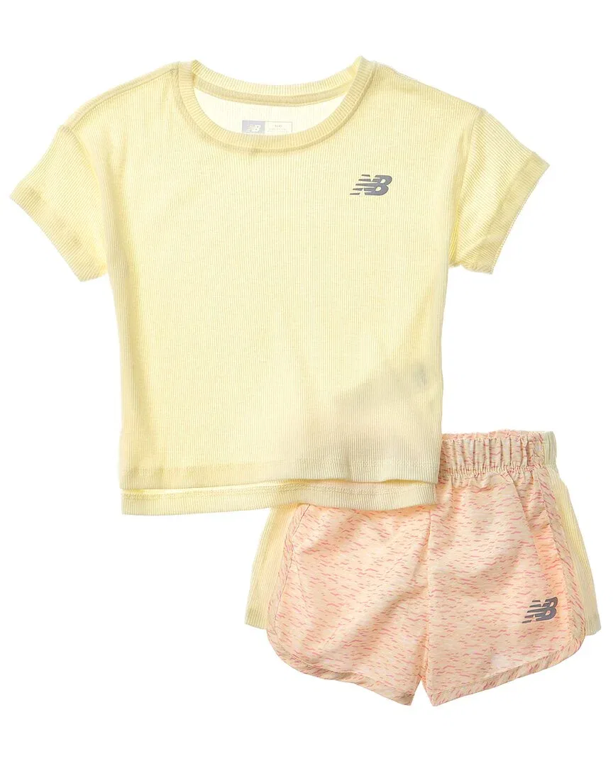 Комплект New Balance из 2 предметов: футболка и тканые шорты, желтый