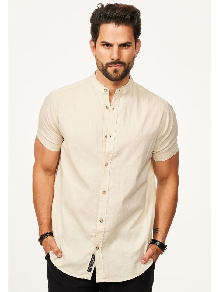 

Рубашка с коротким рукавом - летняя рубашка из льна прямого кроя бежевого цвета. behype