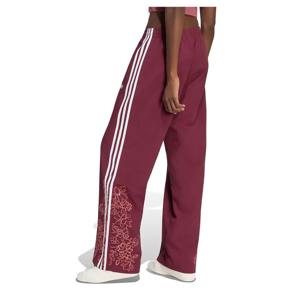 Женские спортивные брюки свободного кроя с флоральным принтом Floral GFX Firebird Adidas Originals, Red — фото 2