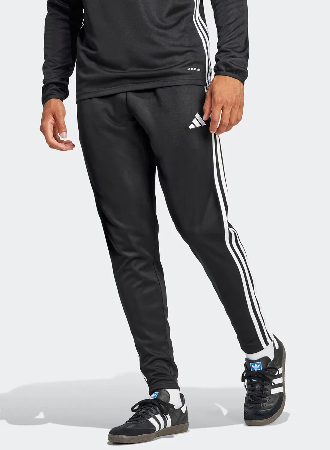 Штаны спортивные с влагоотводящей технологией Tiro25 Essentials Adidas, черный