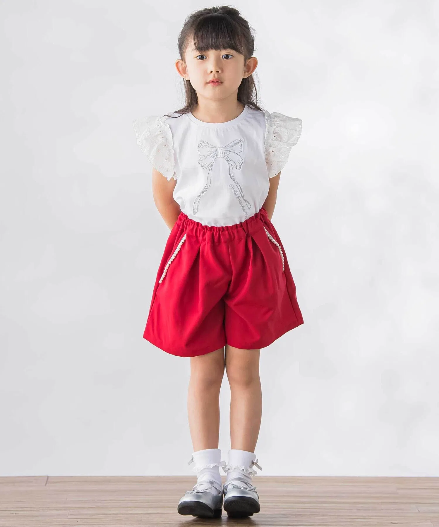 Детская футболка с вышивкой и бантом BeBe Petits Pois Vert розовая — фото 4