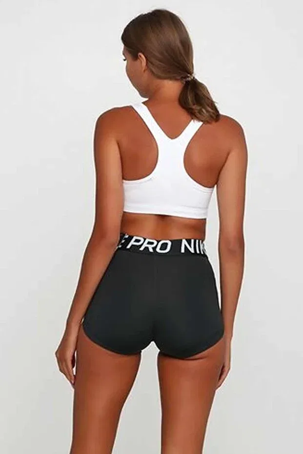 Женский спортивный бюстгальтер с принтом Swoosh Futura Bra Nike, White — фото 2