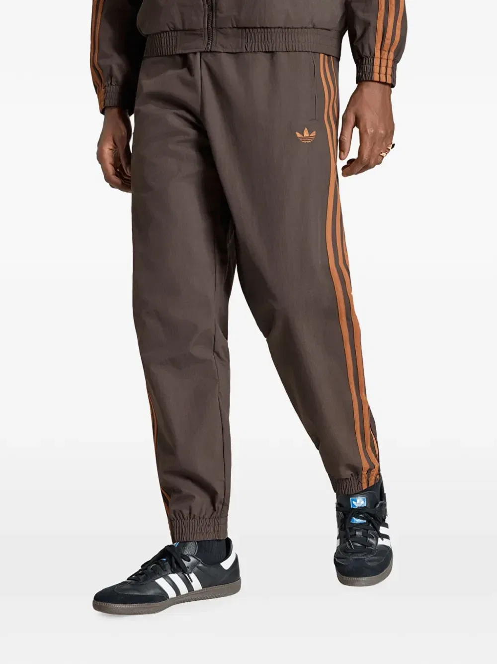 Спортивные брюки Firebird с боковыми полосками adidas, коричневый