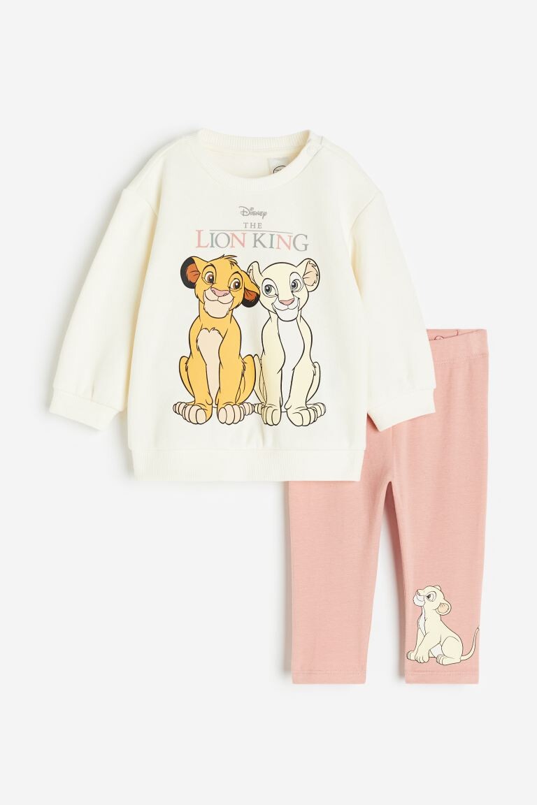 

Хлопковый костюм H&M The Lion King 2-piece Printed, кремовый/розовый
