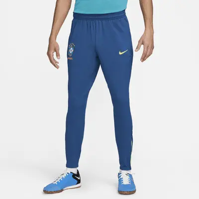 

Брюки Nike Brazil Strike, цвет Court Blue/Action Green/Dynamic Yellow