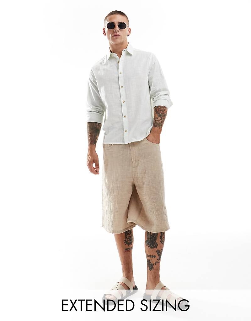 

Синяя рубашка непринужденного льняного кроя ASOS DESIGN