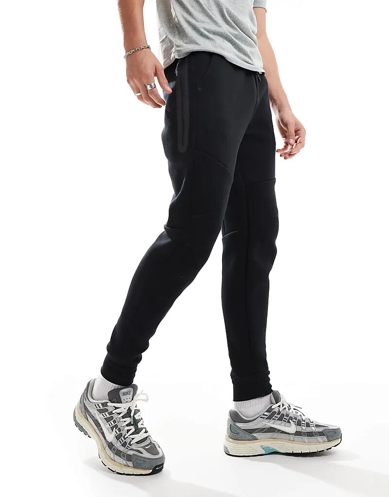 Джоггеры Tech Fleece черного цвета Nike — фото 4