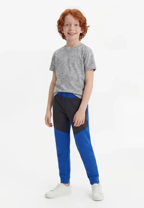 Брюки tapered из футера Nike Sportswear, game royal/anthracite/black, черный