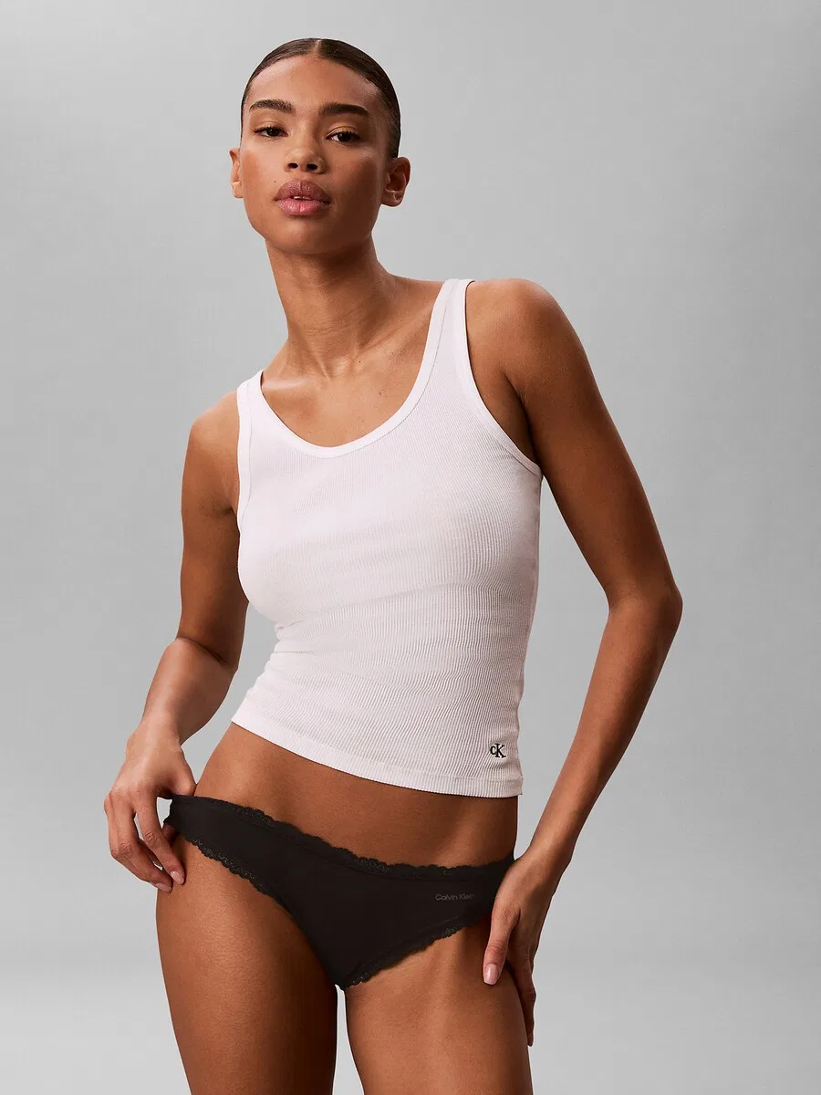 Трусики-стринги Calvin Klein серого и черного цвета — фото 2