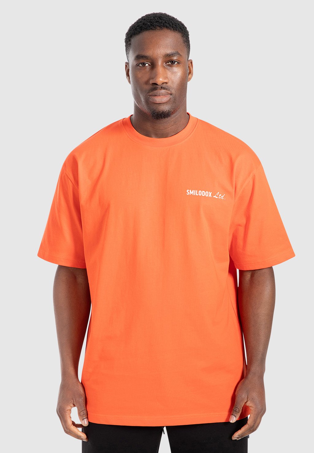 

Футболка с принтом UNISEX Smilodox, коралловый