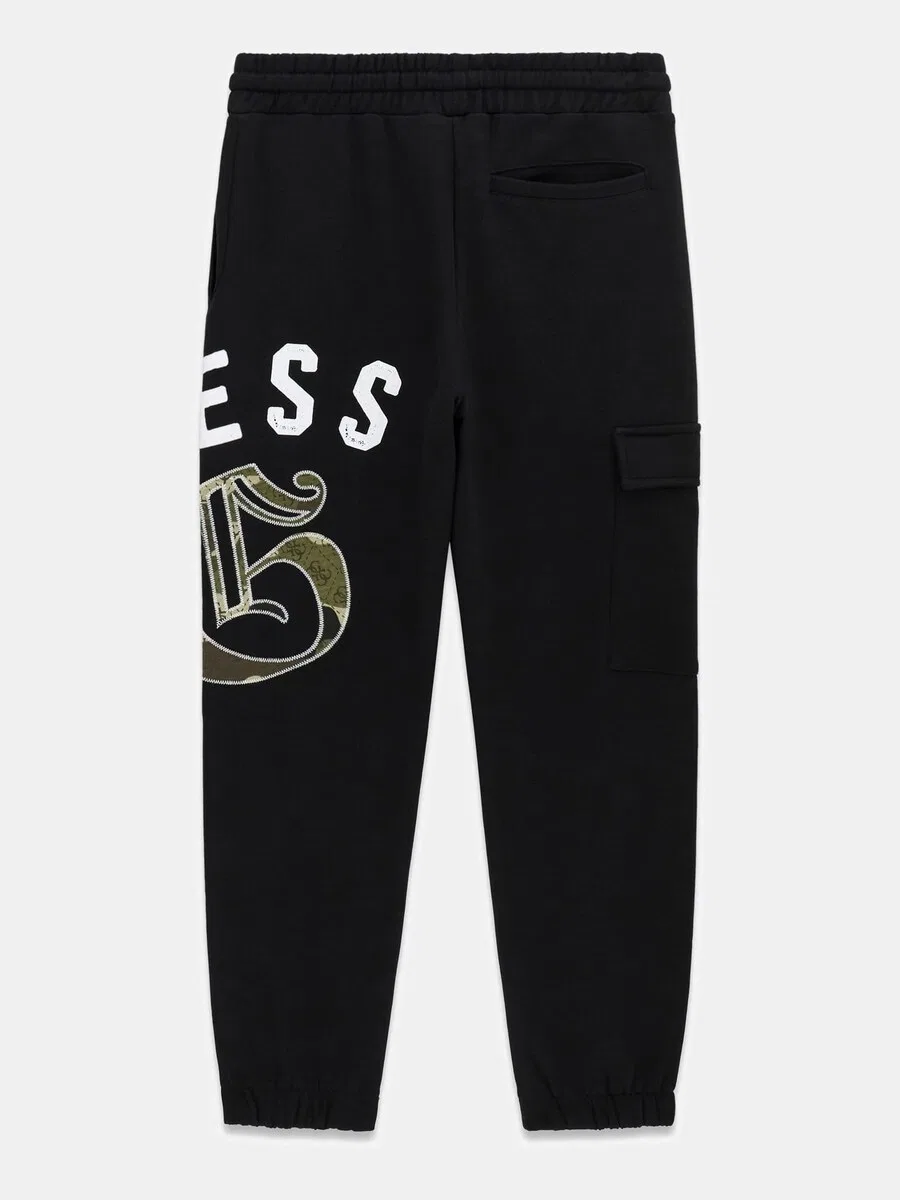 Зауженные брюки GUESS черного цвета — фото 2