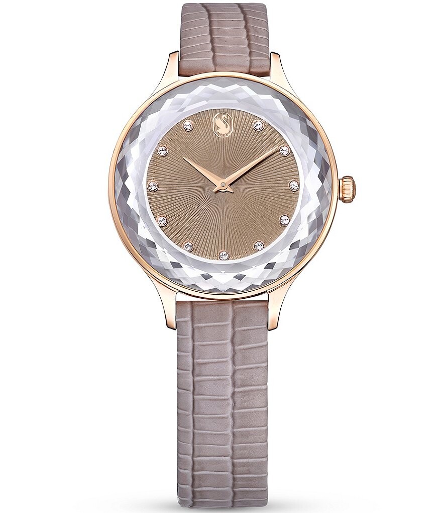 

Женские кварцевые аналоговые часы Swarovski Octea Nova с бежевым кожаным ремешком, фиолетовый